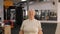 elderly woman performs exercises, physical education. Active, sporty, healthy lifestyle. Senior concept. Indoor. Happy