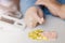 Elderly woman with pills hand, grandmother with medicines