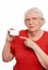 Elderly woman pointing to a business card