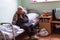 Elderly woman in rehabilitation department in Center of social services for pensioners and the disabled.