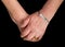 Elderly woman`s hands with medical alert bracelet for diabetes.