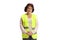 Elderly woman with a safety vest smiling at the camera