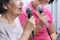 Elderly woman sing a song with daughter at home.