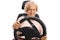 Elderly woman sitting in a car seat and driving