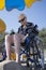 Elderly woman sitting in a wheelchair on the beach