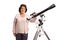 Elderly woman with a telescope looking at the camera and smiling