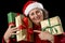 Elderly Woman with Three Wrapped Christmas Gifts