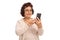 Elderly woman using a phone and smiling