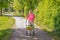 Elderly woman using a walker to do her shopping