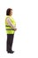 Elderly woman wearing safety vest, standing and waiting