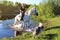 Elderly woman on a white horse enjoying a beautiful day