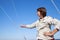 Elderly woman yachtsman on a sailing yacht