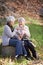 Elderly women, happy and snack in park with candy floss, eating and together to relax on retirement in outdoor. Senior