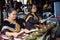 Elderly women playing gong