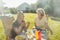 Elderly women relaxing at backyard barbecue party