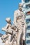 Elderly and young â€“ old sculpture of engineer and his scholar on Zoll Bridge in Magdeburg downtown at blue sky background,