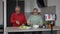 Eldery couple cook together, explain recipe and record video for vlog and social media