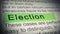 Election. Highlighter pen marks word in an open book. Closeup. Thumbing pages and promoting text with marker.