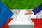 Elections in the country - voting at the ballot box. A man`s hand puts his vote into the ballot box. Flag Equatorial Guinea on