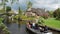 Electric boat at canal in romantic water village Giethoorn in the Netherlands