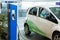 Electric car charged on a charging station in a indoor parking