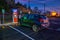 Electric car at charging point at night in California