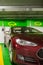 Electric car at a charging point in an underground parking