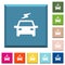 Electric car with flash white icons on edged square buttons