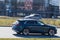 Electric car on the street. Audi E-Tron 50 prestige business class electric car. Motion blur. Riga, Latvia - 12 Apr 2022
