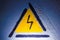 Electric danger Signal lightning in the blue metal