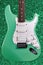 Electric Guitar in. Bright Surf Seafoam Green - Rock Band Guitarist Musician Colorful Glitter Background