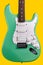 Electric Guitar in. Bright Surf Seafoam Green - Rock Band Guitarist Musician, Yellow Background