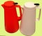 Electric kettle, made of multicolored shiny heat-resistant plastic of modern design and shape