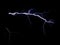 Electric lightning discharge on a black background