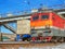 Electric locomotive pulling a cargo train at one of the marshalling yard of Trans-Siberian Railway