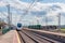 Electric passenger train waiting next to the platform