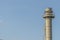 Electric plant chimney against the blue sky background, Power plant flue