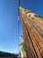 Electric pole made of wood, cable, blue sky
