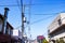 Electric pole with wires and lamp outdoor in the streets organized wiring is neat at bright sky background.