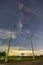 Electric poles in the nighttime countryside, the sky with stars and beautiful taro scenes, clouds below the horizon above the