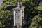 Electric power transformer on a public lighting pole on street