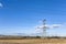 Electric pylon in landscape