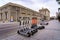 electric scooters parked in a street in the royal palace of madrid