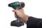 Electric screwdriver held in a man& x27;s hand. Tools for the builder