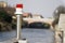 Electric signal lantern on the river water canal, beacon for the boats