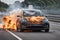 electric sport car ev battery explosion burn fire flames, sunset in the motorway