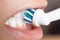Electric toothbrush head on white clean teeth