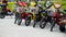 Electric toy vehicles and Bicycles aligned in a line for rent in a outdoor park ,SETIA ALAM,SELANGHORE,MALAYSIA:09/20/2020