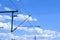 Electric train lines railway electrification overhead system with wires and blue sky above