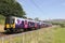 Electric train on West Coast Mainline in Cumbria